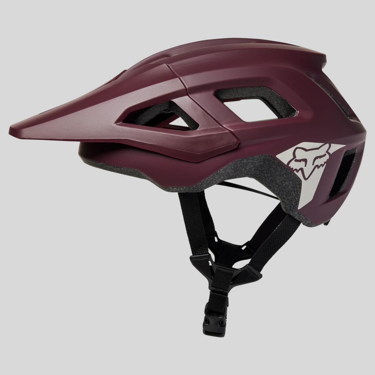 Casco de bicicleta para niño MZ Bikes Fox Mainframe MIPS en color morado con visera y sistema de protección integrado