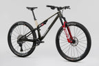 NUEVA: Norco Revolver C1 120, aro 29 2026 | Fast Black Raw Carbon / Warm Grey