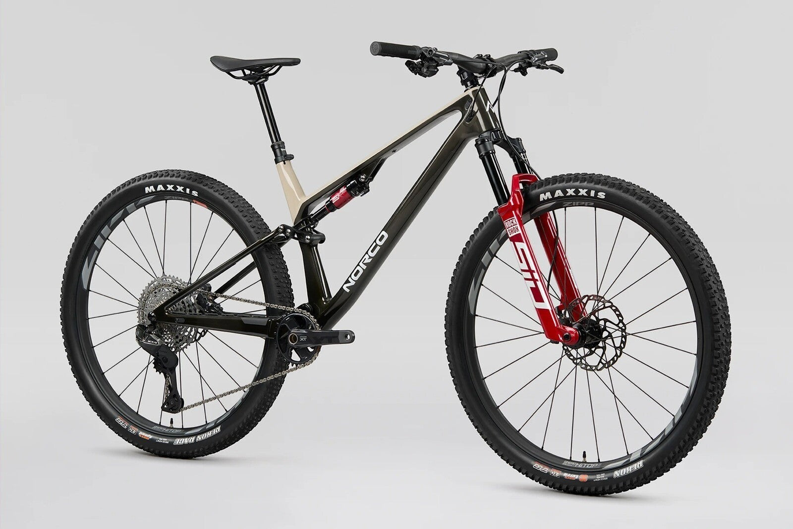NUEVA: Norco Revolver C1 120, aro 29 2026 | Fast Black Raw Carbon / Warm Grey