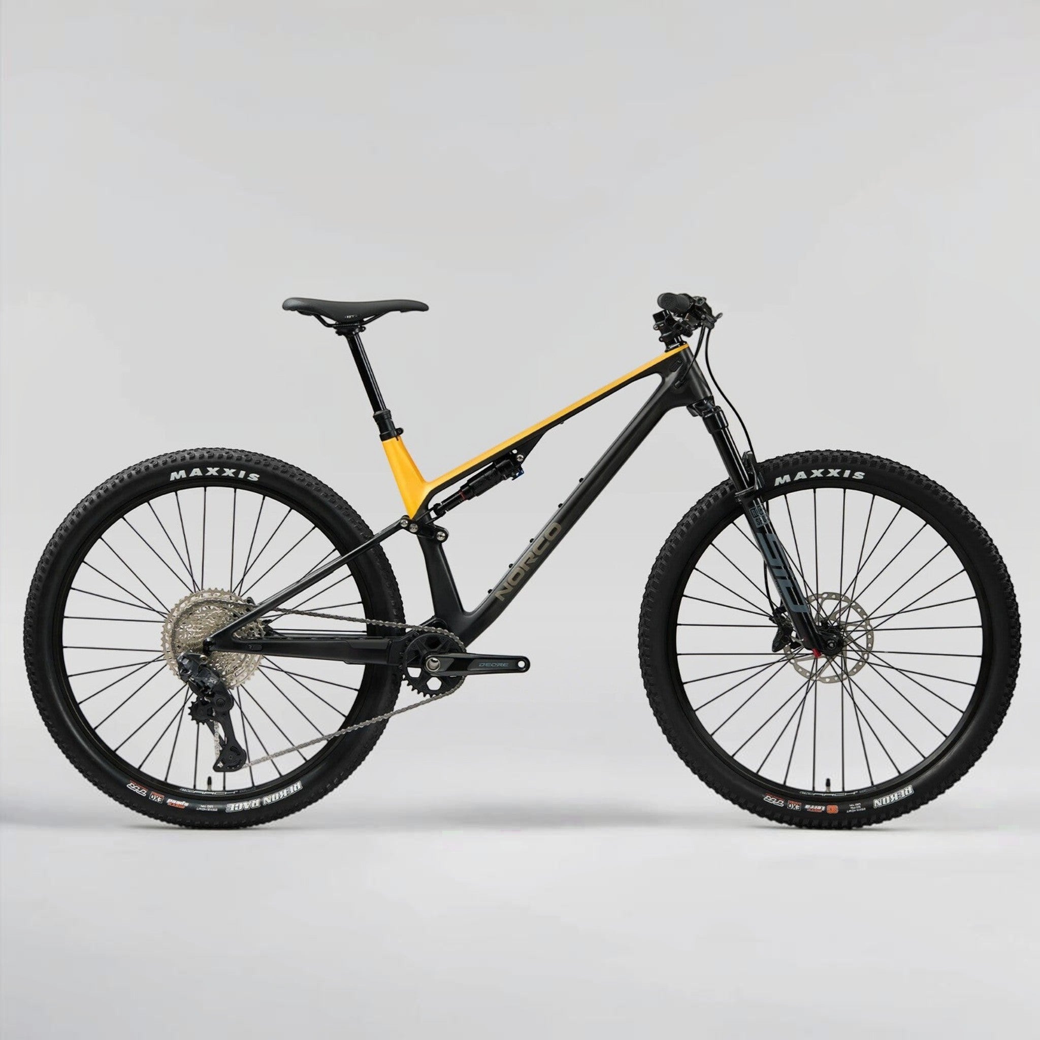 NUEVA: Norco Revolver C2 120, aro 29 2026 | Fast Black Raw Carbon / Golden Larch