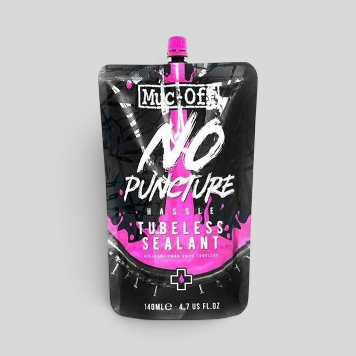 Sellante tubeless MZ Bikes Muc-Off No Puncture Hassle de 140ml con fórmula rosa y detección UV para neumáticos