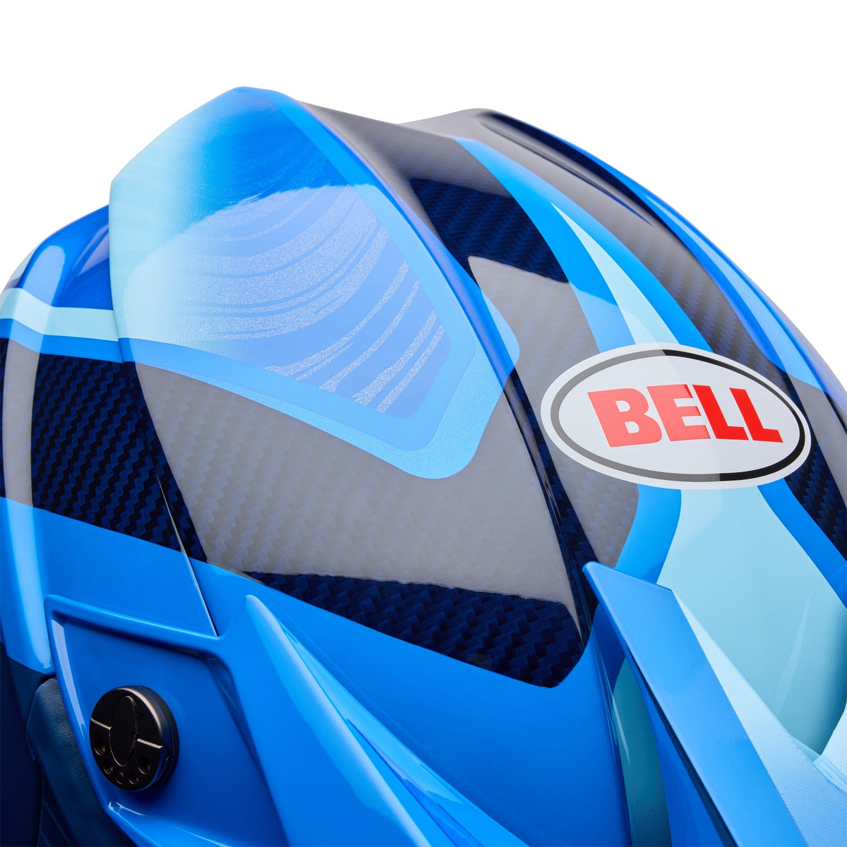 Detalle de la carcasa segmentada 3K y el logo Bell del casco Moto-10 Spherical ET3 Azul