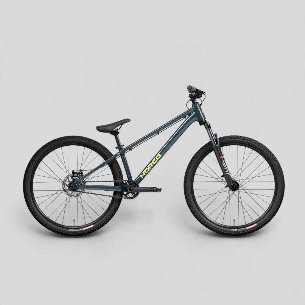 Bicicleta de dirt jump MZ Bikes Norco Rampage 2 en color gris azulado con cuadro de aluminio y horquilla RST