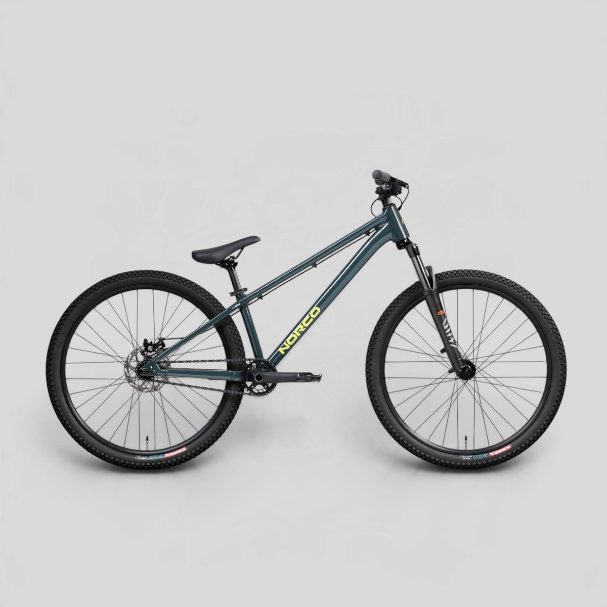 Bicicleta de dirt jump MZ Bikes Norco Rampage 2 en color gris azulado con cuadro de aluminio y horquilla RST