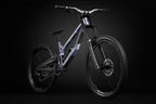 Norco Team DH 2 RockShox Silver/Blue, vista tres cuartos