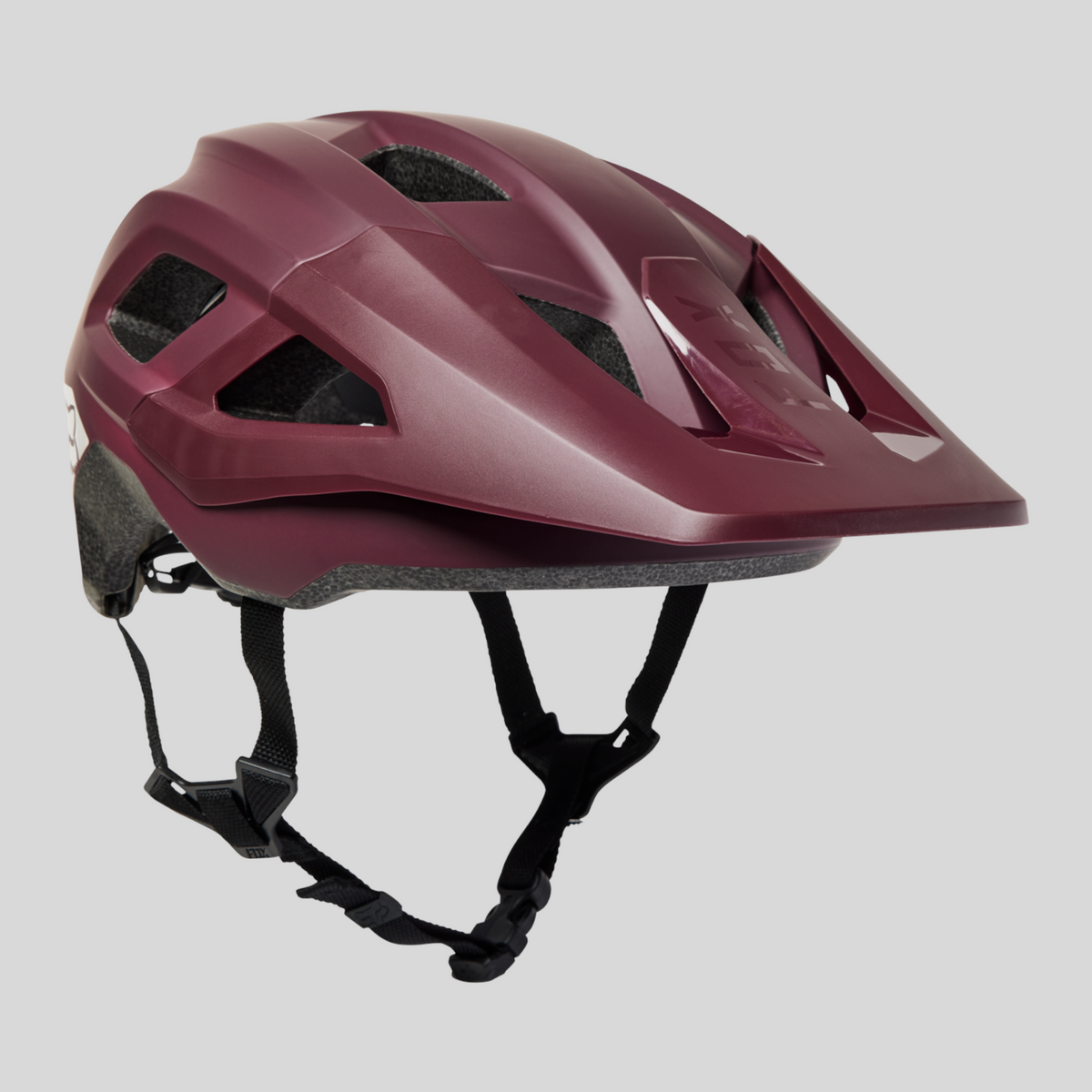 Casco de bicicleta para niño MZ Bikes Fox Mainframe MIPS en color morado con visera y sistema de protección