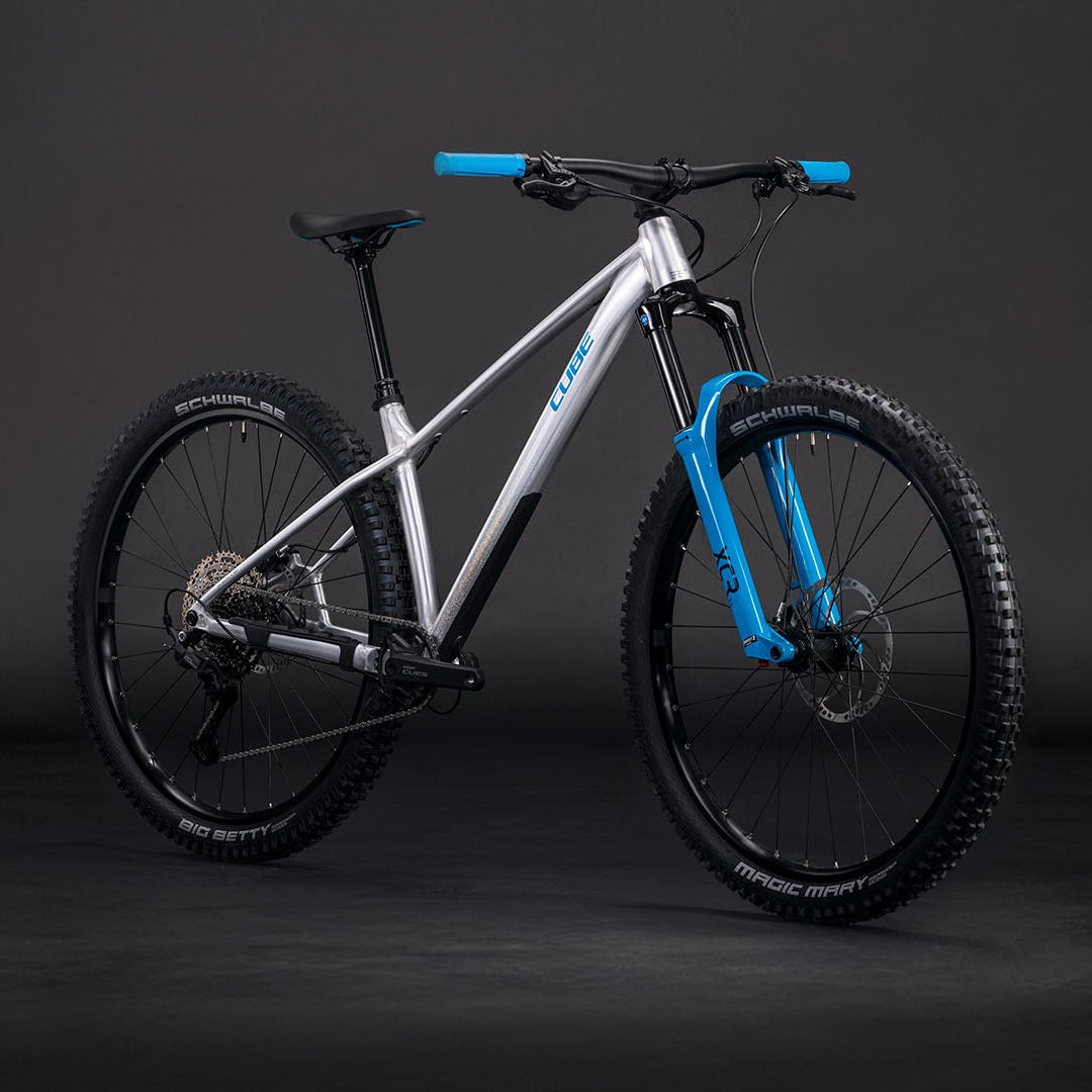 BICICLETA CUBE REACTION TM ONE RAWMETAL´N´BLUE
